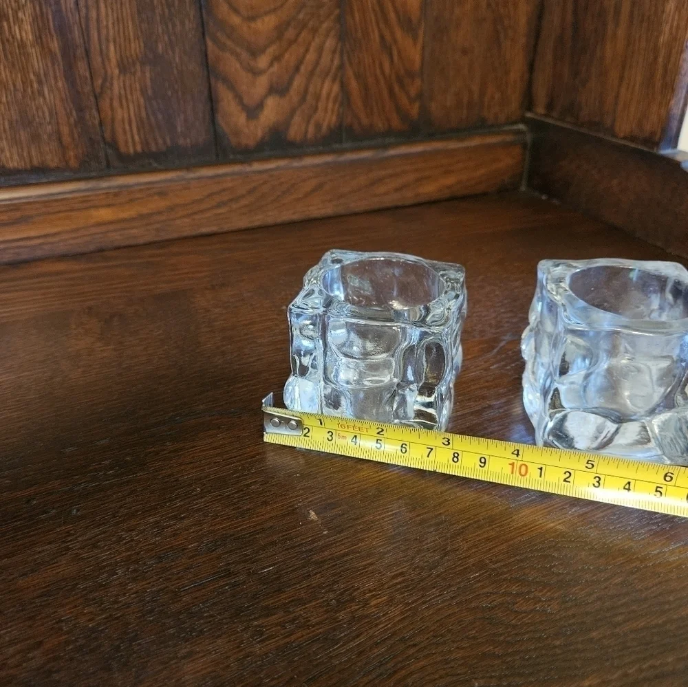 Glass ice cube candle votives.